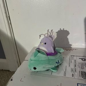 Squishville Squishmallow peacock in a boat